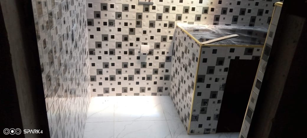 Mosaic wall tiles in bathroom area
